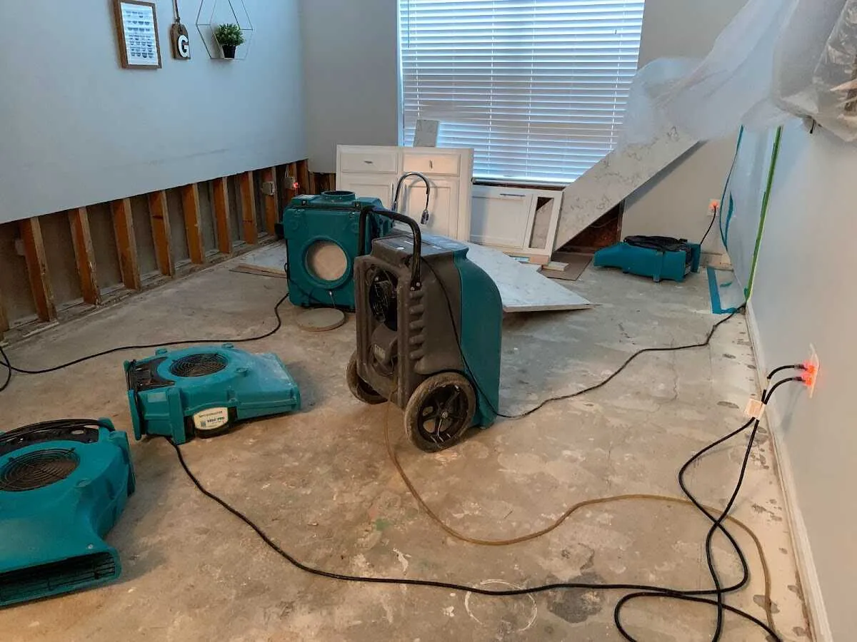 Dehumidifier in flood-cut room for Water Damage Restoration in Woodfin